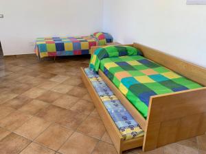 a room with two bunk beds in a room at Tenuta Punta della Suina in Gallipoli