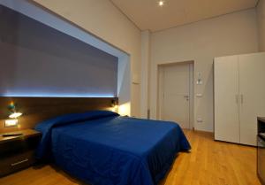 Postel nebo postele na pokoji v ubytování Liddo Boutique hotel