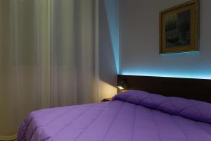 Postel nebo postele na pokoji v ubytování Liddo Boutique hotel