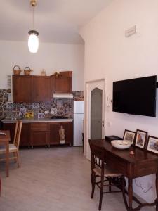 A kitchen or kitchenette at Sweet Home by Giò