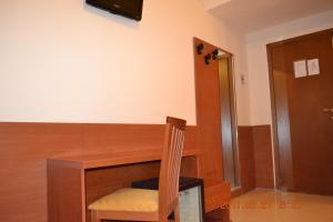 Łóżko lub łóżka w pokoju w obiekcie Hotel Everest