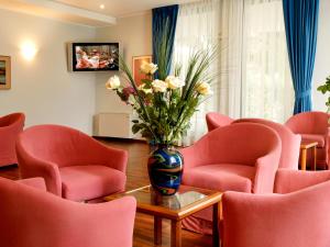 TV a/nebo společenská místnost v ubytování Hotel Villa Rosa