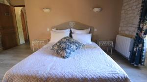 Letto o letti in una camera di Chambre d'hotes la Quercynoise