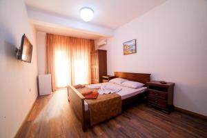 A bed or beds in a room at Sole Mio Még 8 kép
