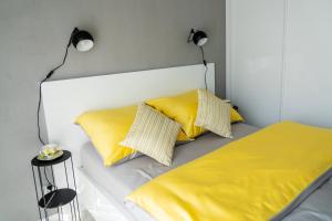 Posteľ alebo postele v izbe v ubytovaní Apartament Wiktoria