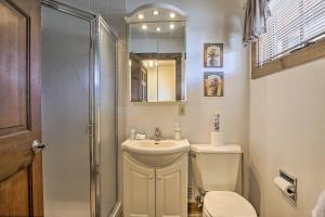 a bathroom with a toilet and a sink and a shower at 2 Mi to Lake Dillon Spacious Condo with Mtn Views in Dillon +20 photos
