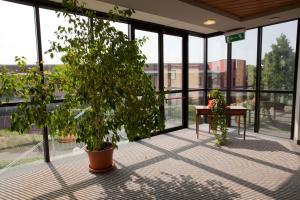 A balcony or terrace at Best Western Mirage Hotel Fiera