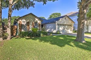 an exterior view of a house with a yard at Peaceful San Antonio Oasis with Private Pool and Grill! in San Antonio
