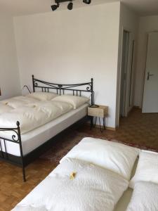 Llit o llits en una habitació de Lakelodge-Romanshorn 2