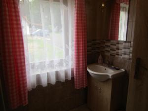 Koupelna v ubytování rekreační dům levandule
