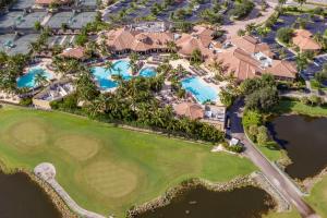 an aerial view of a golf course and resort at Luxurious Golf Course Getaway with Resort Perks in Naples
