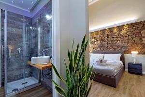 Koupelna v ubytování Il Borgo Luxury Suites + 37 fotografií
