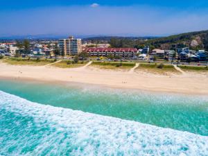 an aerial view of a beach and the ocean at Sandrift Beachfront Apartments in Gold Coast