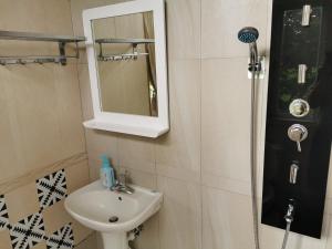 Vannituba majutusasutuses New Flower Homestay