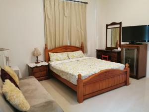 Voodi või voodid majutusasutuse New Flower Homestay toas