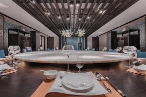 Posezení v ubytování Qingdao Treasure Hotel