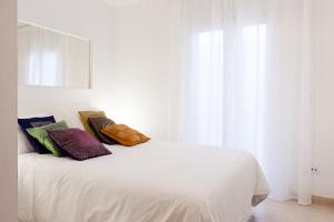 Postel nebo postele na pokoji v ubytování Patio Budget Apartment 12