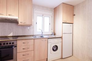 Kuchyň nebo kuchyňský kout v ubytování Patio Budget Apartment 12 + 7 fotografií