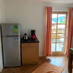 Kuchyň nebo kuchyňský kout v ubytování Apartment with a stunning view of the alps - Wohnung mit atemberaubenden Blick auf die Alpen