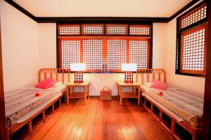 A bed or beds in a room at Badian Island Wellness Resort