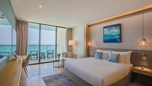 Giường trong phòng chung tại Sel de Mer Hotel & Suites