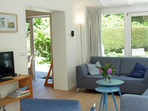 TV/trung tâm giải trí tại Vakantiehuis La petite Redousse