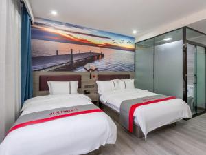 เตียงในห้องที่ JUN Hotels Shanxi Taiyuan Yingze District Chaoyang Street Store