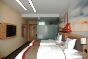 Gallery image of Thank Inn Chain Hotel Tianjing Jingnan District Balitai Town Industrial Park in Tianjin +7 photos