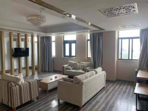 Istumisnurk majutusasutuses Thank Inn Chain Hotel Jiangsu Yangzhou Gaoyou Shangcheng International