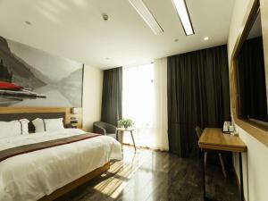 Imagen de la galería de Thank Inn Chain Hotel Zhejiang Haining Chang'an Town Hongyuan Flower City, en Haining
