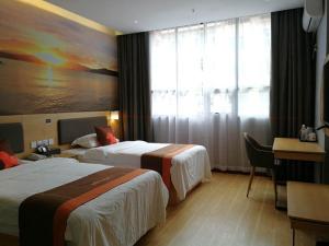 JUN Hotels Guizhou Tongren Jiangkou County Fanjingshan Store 객실 침대