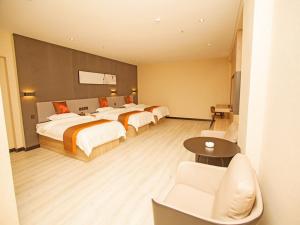 Katil atau katil-katil dalam bilik di JUN Hotels Hebei Shijiazhuang Wuji County Zhengyi Street Store
