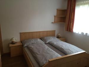 Ένα ή περισσότερα κρεβάτια σε δωμάτιο στο Appartement Humeraleitn