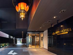 a lobby of a hotel with a chandelier at APA Hotel Akihabara Ekimae in Tokyo