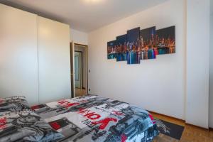 Postel nebo postele na pokoji v ubytování ZIA DINA APARTMENT