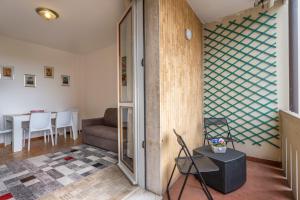 Posezení v ubytování ZIA DINA APARTMENT