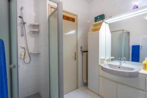 Koupelna v ubytování ZIA DINA APARTMENT + 12 fotografií