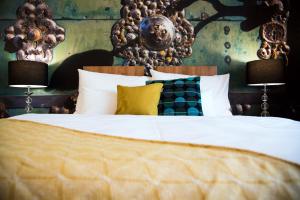 Кровать или кровати в номере Boutique Hotel Golf Garni
