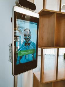 an iphone displaying a picture of a football player at Nayino Resort Hotel in Mamaia Nord