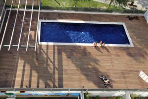 Bazén v ubytovaní 1217 - POOL AND BEACH NICE APARTMENT II alebo v jeho blízkosti