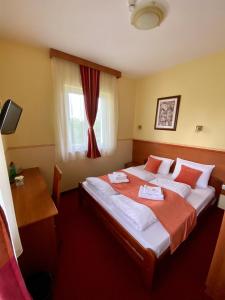 Voodi või voodid majutusasutuse Villa Larus toas