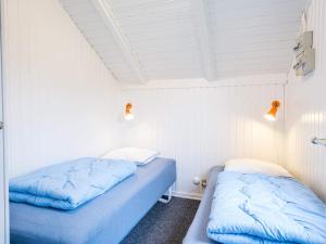 Ліжко або ліжка в номері Holiday home Vejers Strand XI