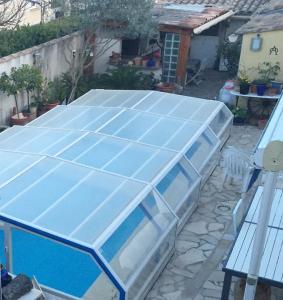 Photo de la galerie de l'établissement Studio avec piscine partagee jardin clos et wifi a Lunel Viel, à Lunel-Viel