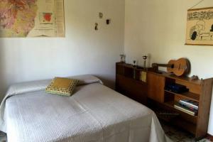 Posteľ alebo postele v izbe v ubytovaní EtnaFamilyHouse