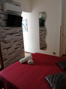 Posteľ alebo postele v izbe v ubytovaní Le Rocce Holiday Rooms