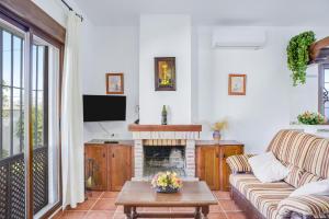 TV a/nebo společenská místnost v ubytování Chalet Villanueva - Sólo Familias