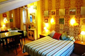 A bed or beds in a room at Casa de Huespedes Dolce Vita