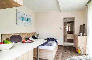 Posteľ alebo postele v izbe v ubytovaní Pilger Apartments