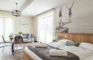 Posteľ alebo postele v izbe v ubytovaní Pilger Apartments