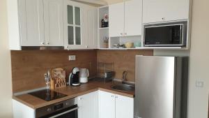 A kitchen or kitchenette at Cascadas Ravda - Gorgeous 2 bedrooms family apartment